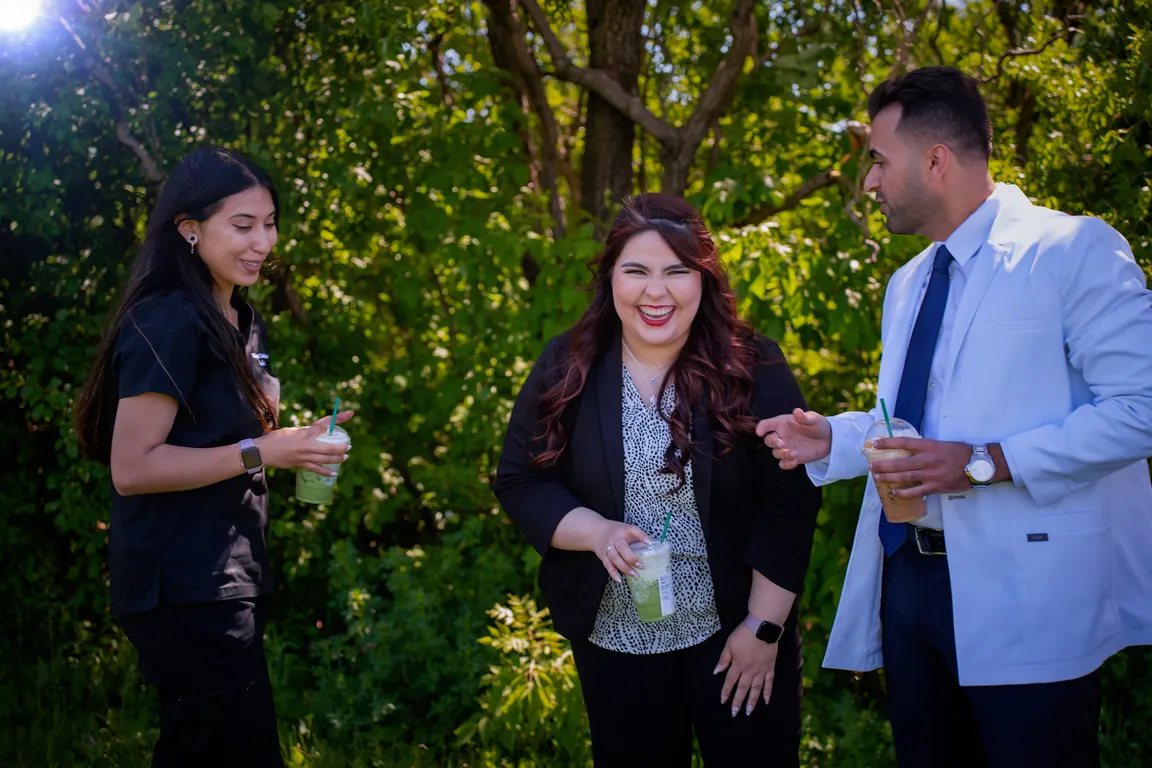 Mount Prospect Dental Care team members talking outside the W Algonquin Road office