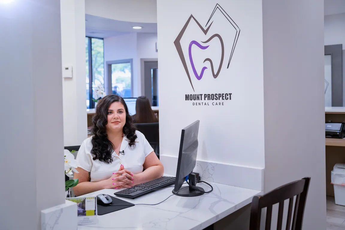 Patient care coordinator at the front desk of the Mount Prospect, IL dental office